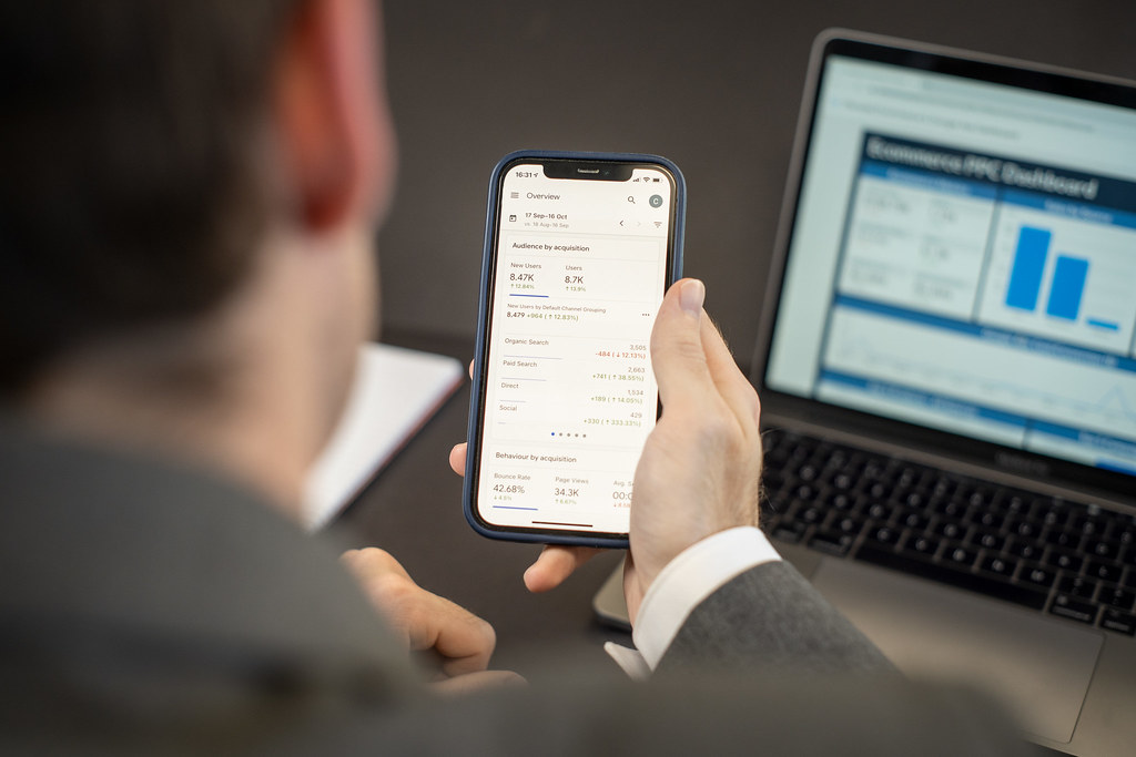 Analytics dashboards on a phone and laptop